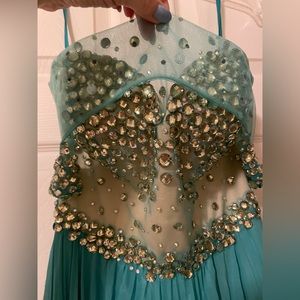 Beautiful and intricately detailed beaded prom dress from Norman’s Bridal